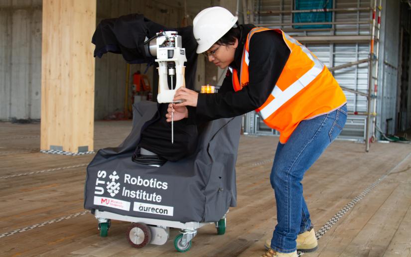 Autonomous Screw-Fixing Robots for CLT Panel Building Assembly